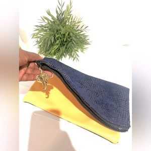 Vegan leather numbered bag. Blue & gold hand bag. Like new. Smoke free home.